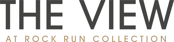 village of royal oak apartments logo