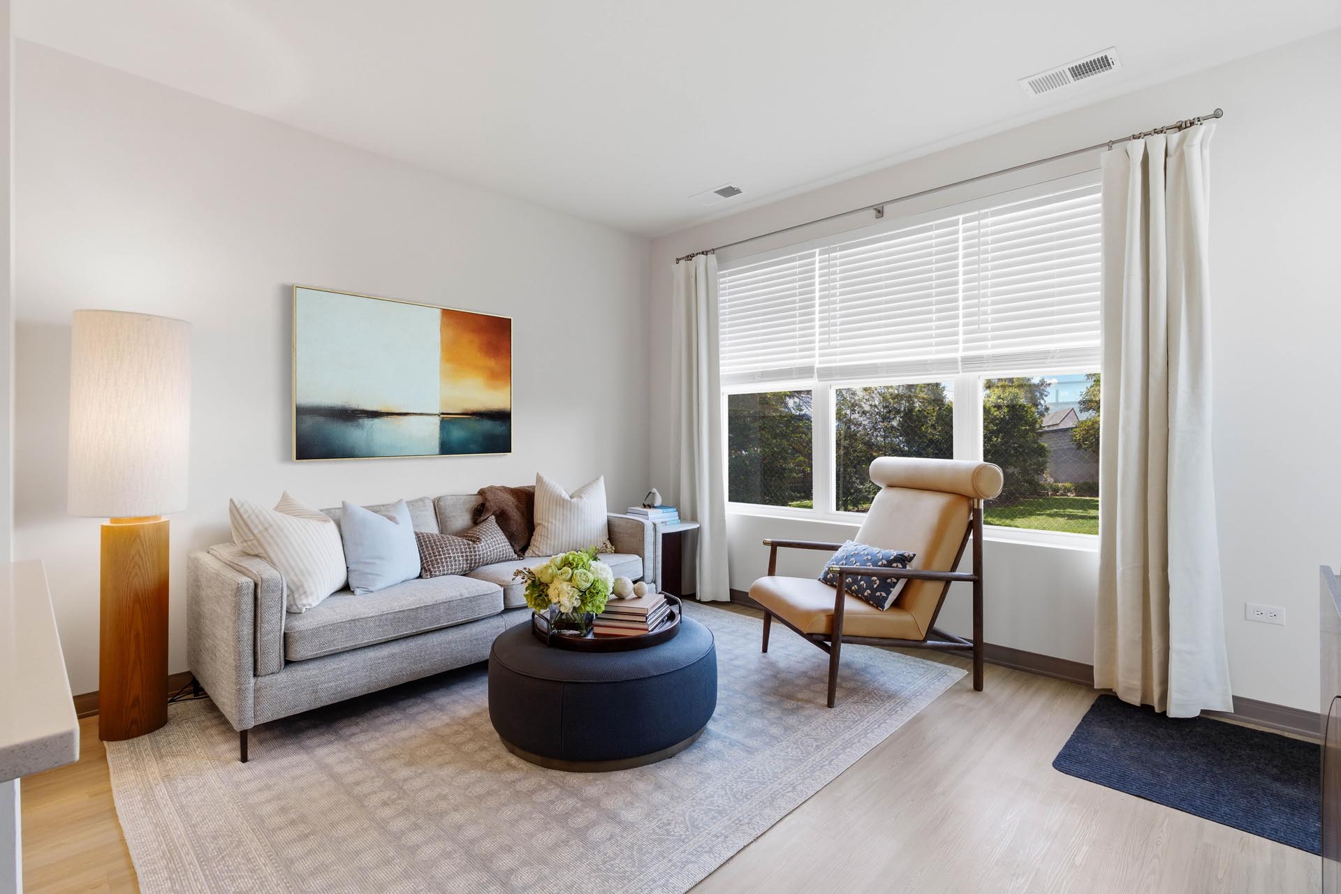 interior rendering of an apartment clubhouse with two pool tables and many windows